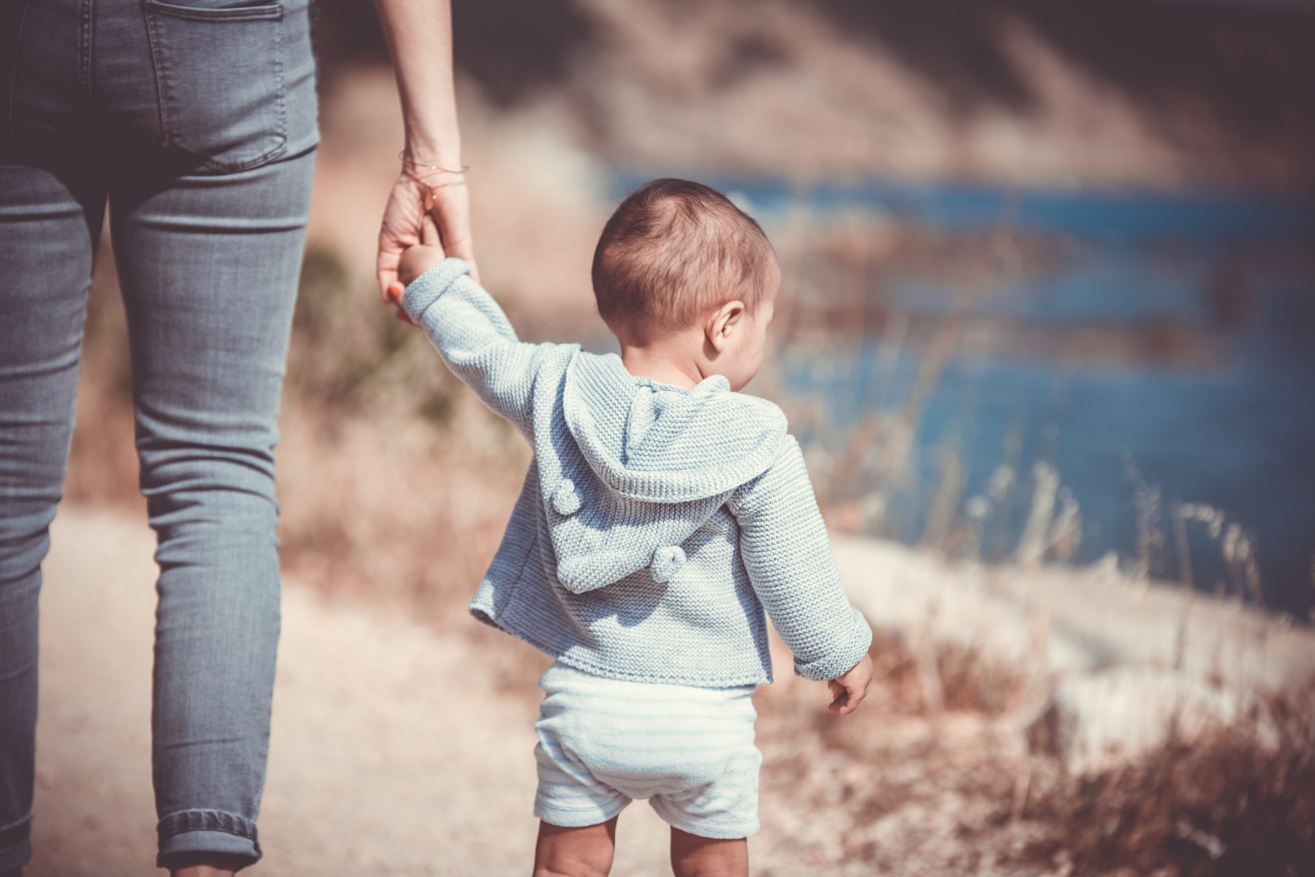 Child holding an adult hand