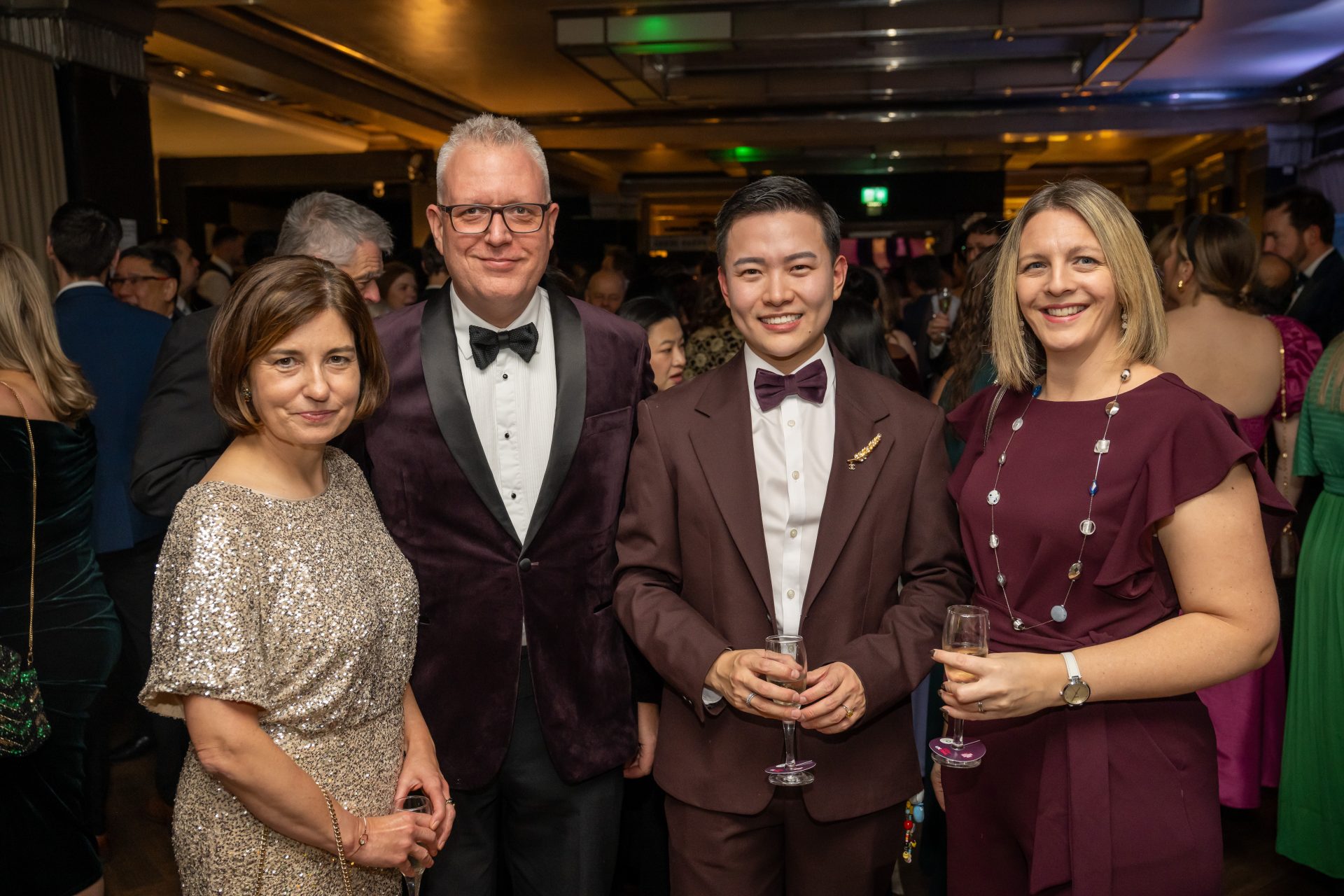 Emma Marku poses for a photo with three others at the awards